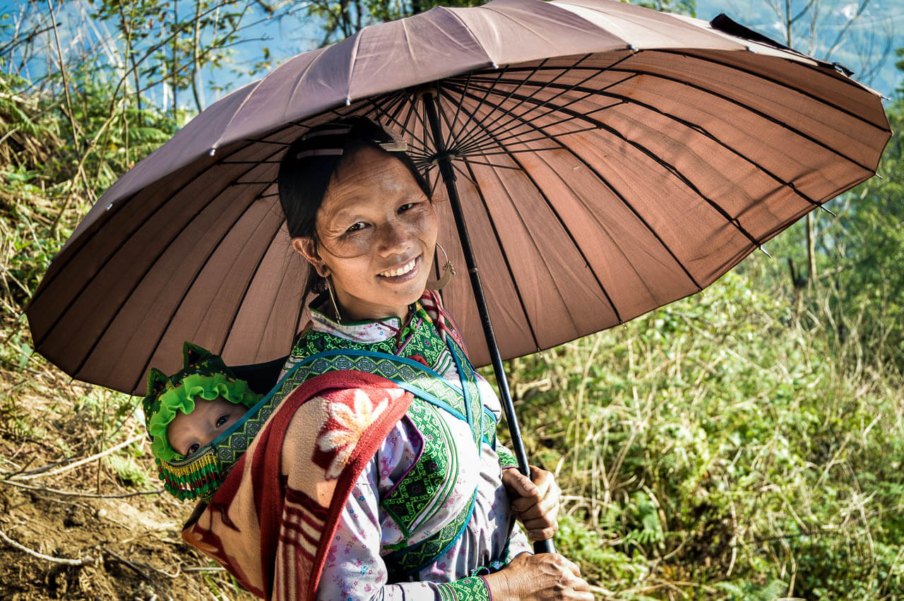 Shu Shu, Hmong tribe woman and her baby Sapa Vietnam 2016